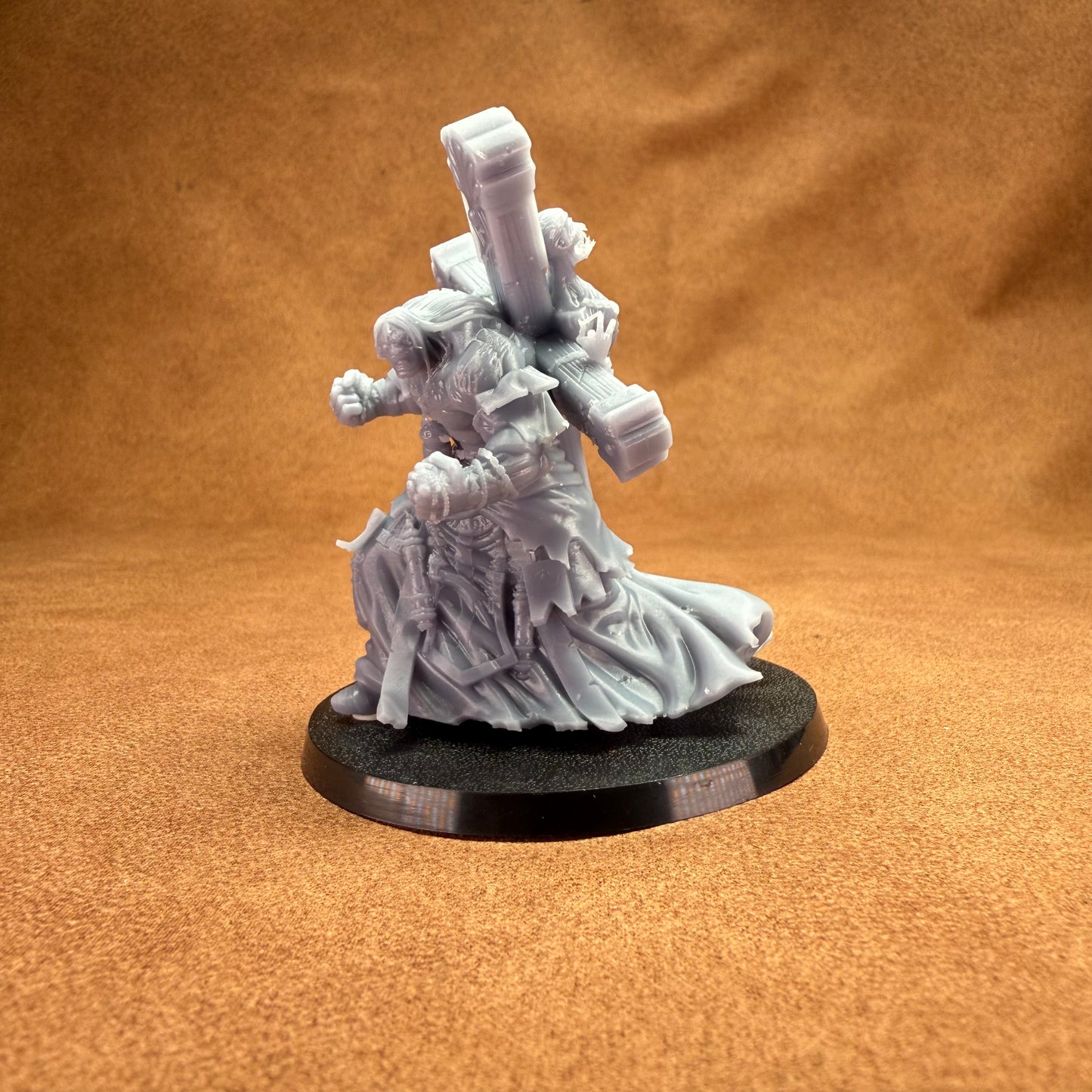 32mm scale man carrying a cross with person on for dungeons and dragons