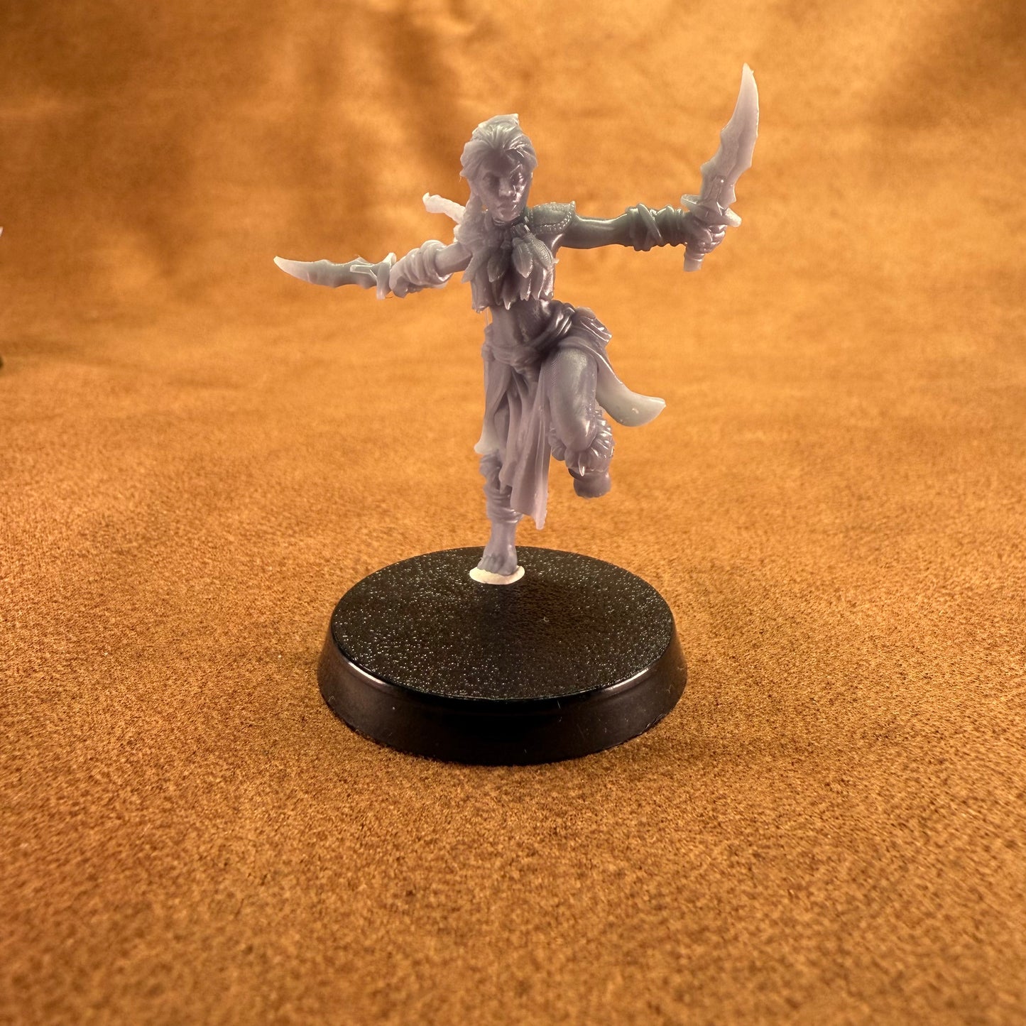 Fantasy figurine on a brown surface