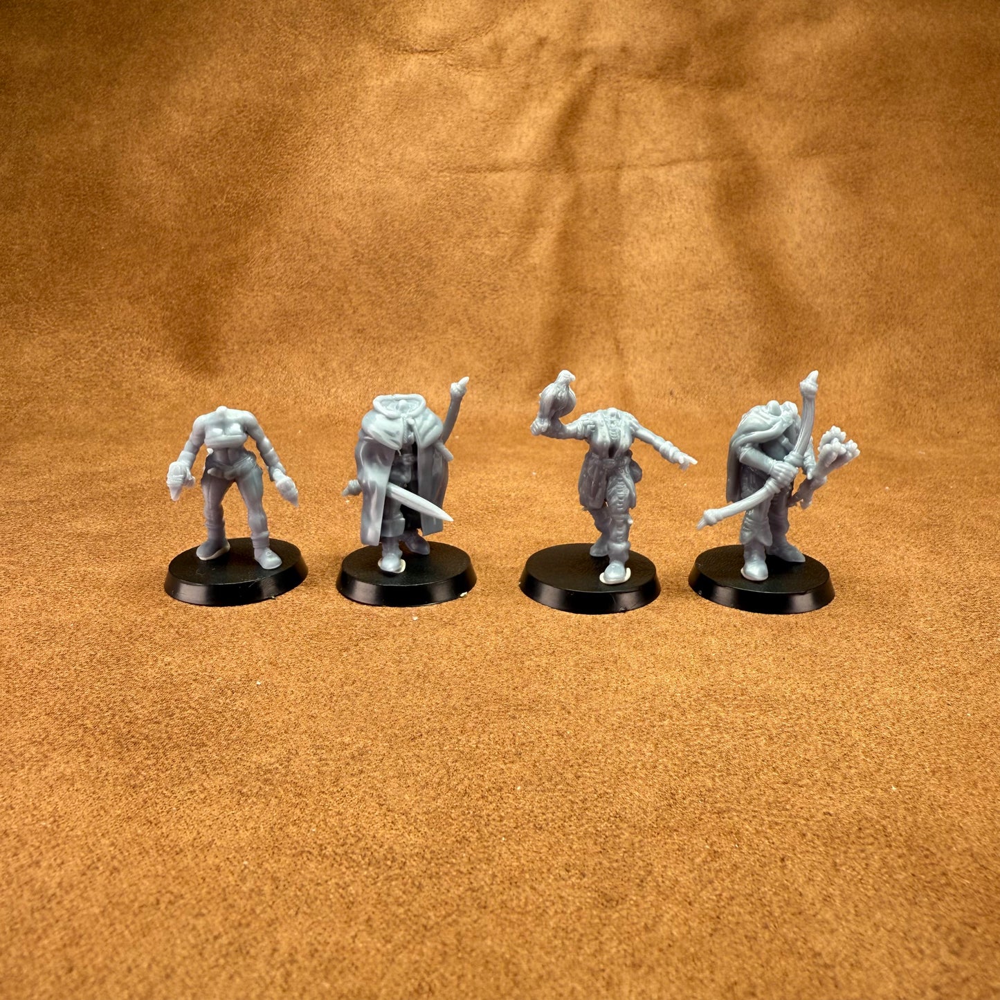 4 resin 28mm male and female medieval poacher without heads to allow more customisation including one with hawk on hand