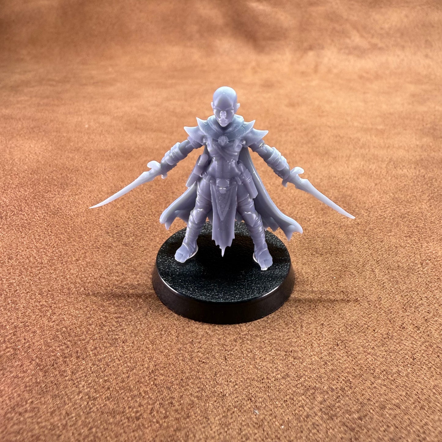 Fantasy figurine on a brown surface