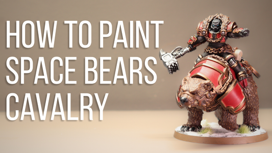 how to paint space bears cavalry in text next to a painted bear with warrior sat on top holding a hammer and pointing