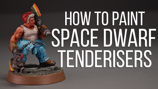a painted lady space dwarf miniature holding 2 axes on a grey background next to the words how to paint space dwarf tenderisers