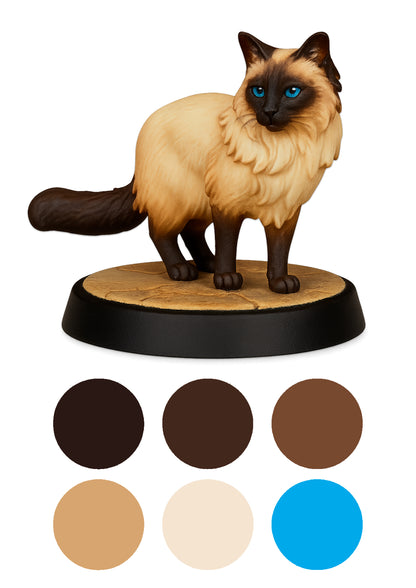 Cat figurine with color swatches on a white background