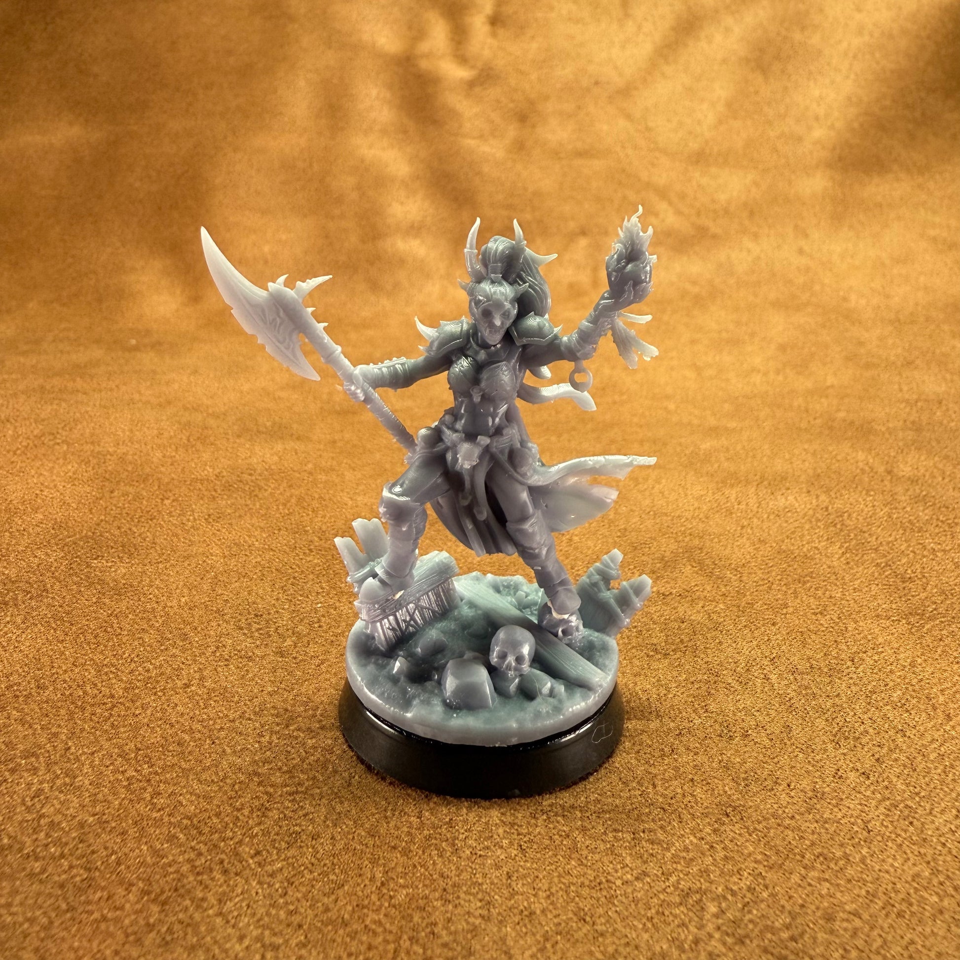 Fantasy figurine on a brown textured background