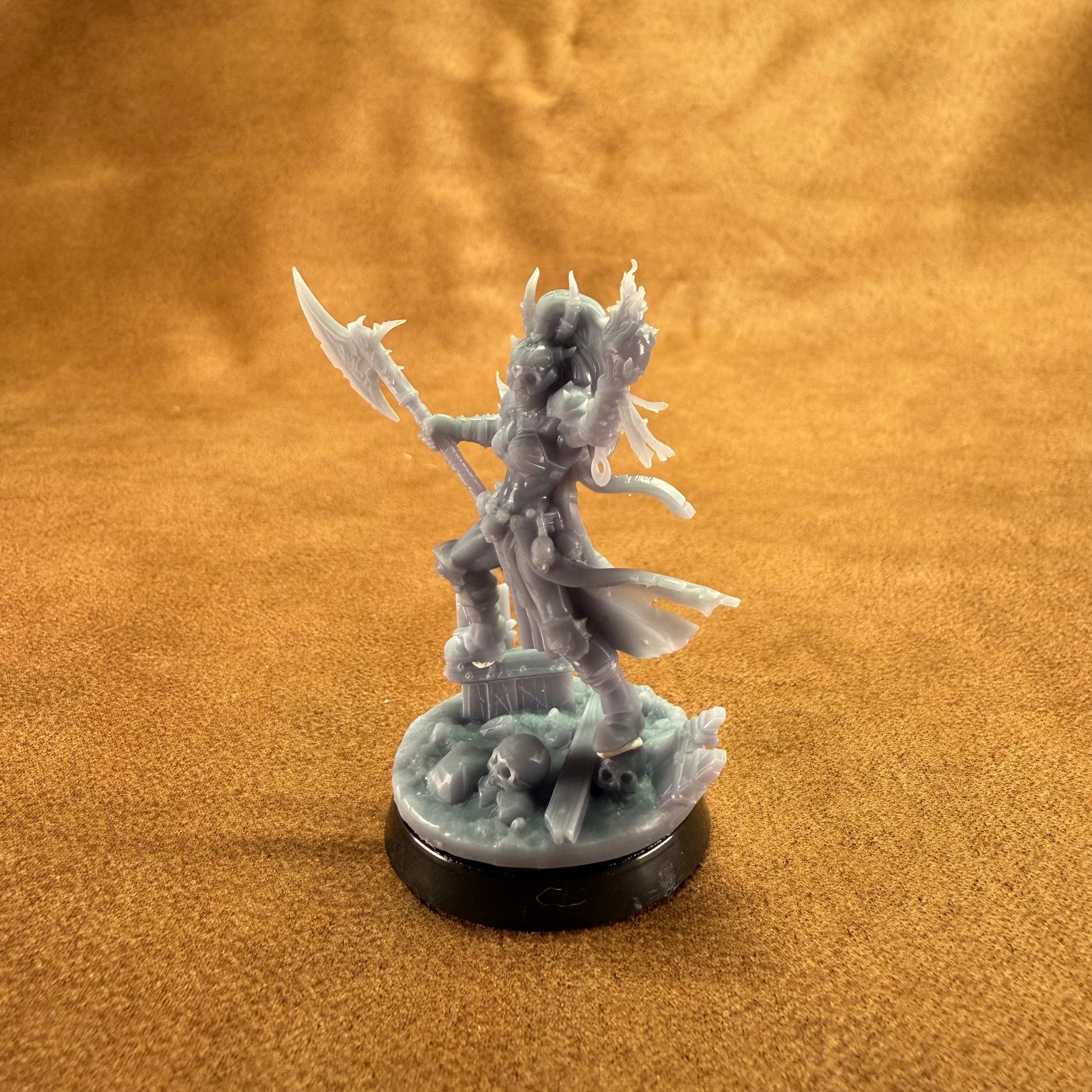 Fantasy figurine on a brown textured background