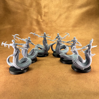 Game piece figures on a brown background