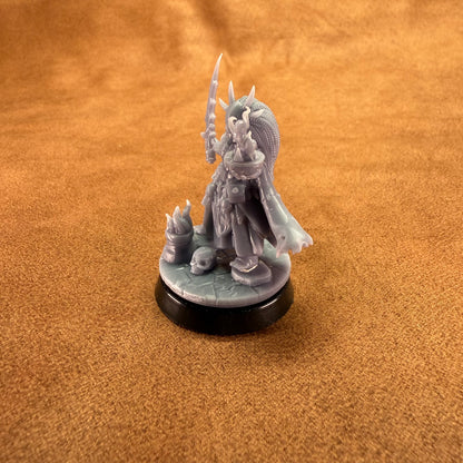 Fantasy figurine on a brown surface