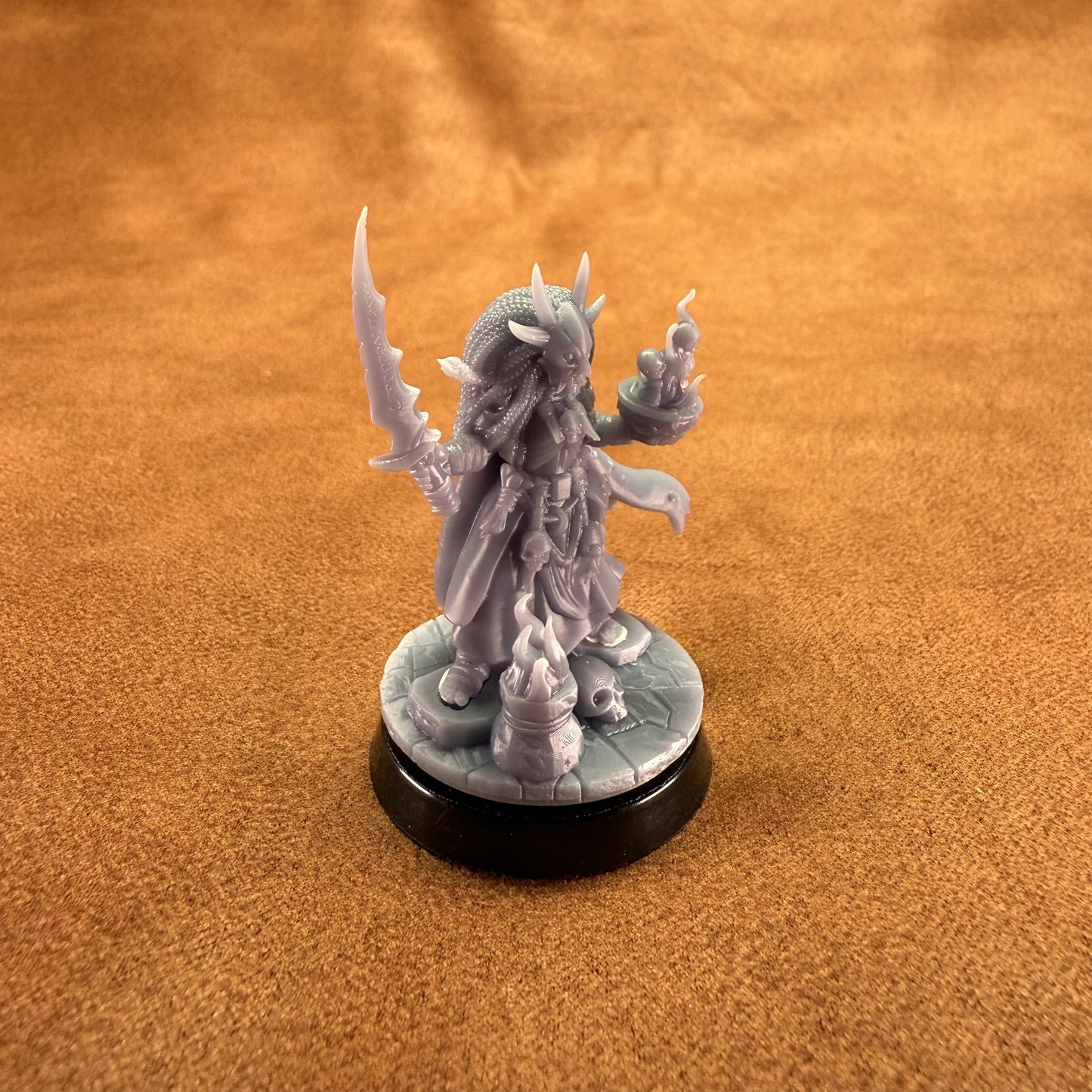 Fantasy figurine on a brown surface