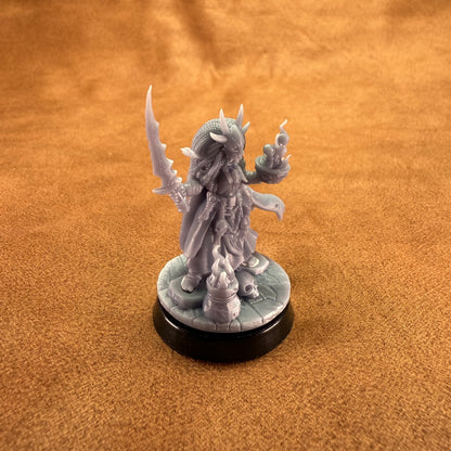Fantasy figurine on a brown surface