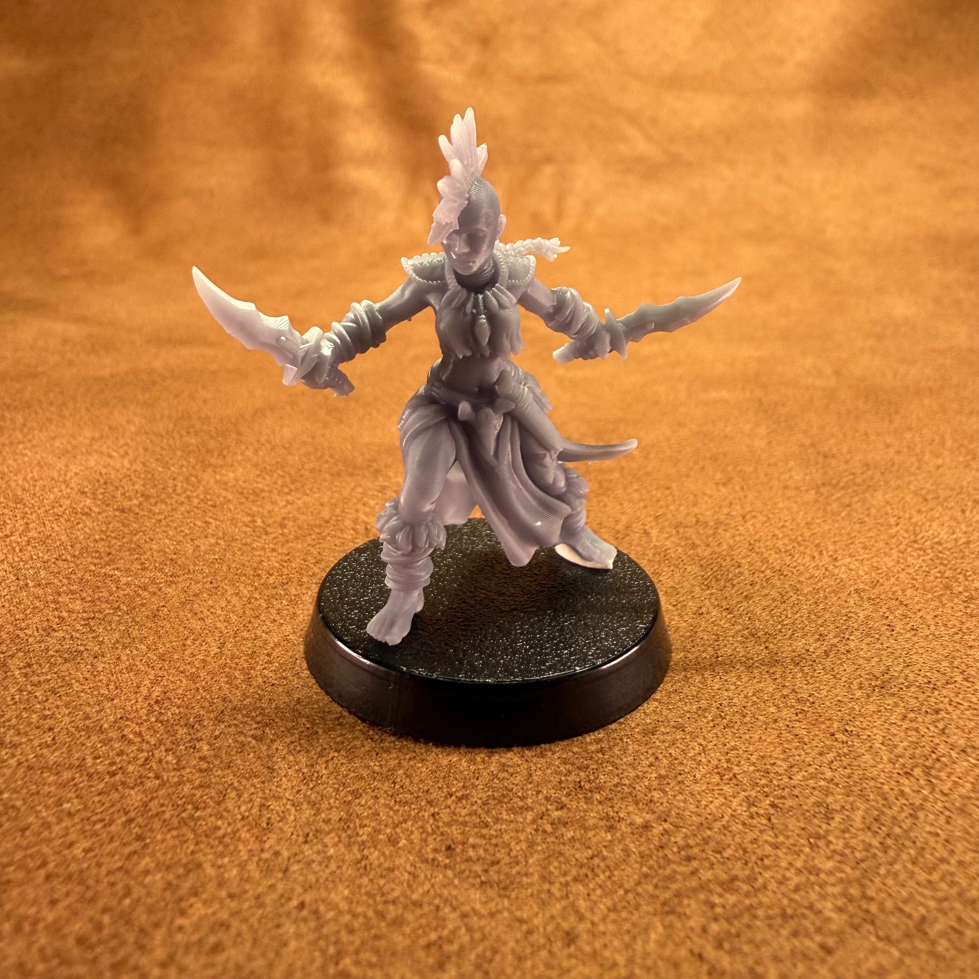 Fantasy figurine on a brown textured background