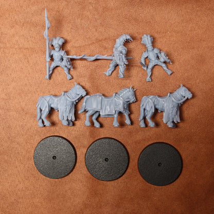 Set of gray plastic figures and horses on a brown surface