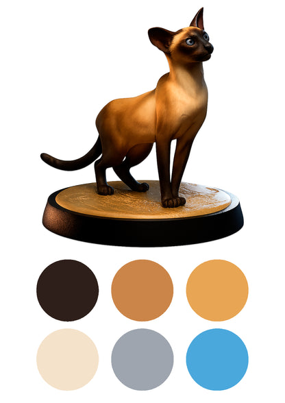 Cat figurine on a wooden base with color swatches below