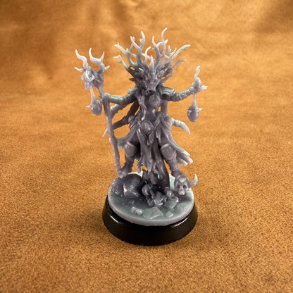 Fantasy figurine on a brown surface