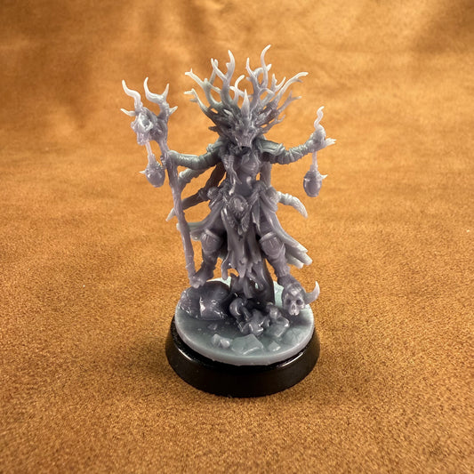 Fantasy figurine on a brown surface