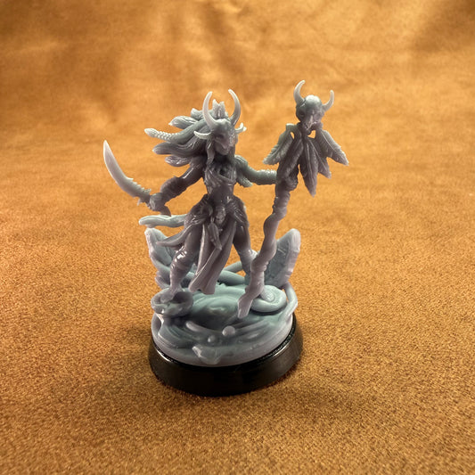 Fantasy figurine on a brown surface