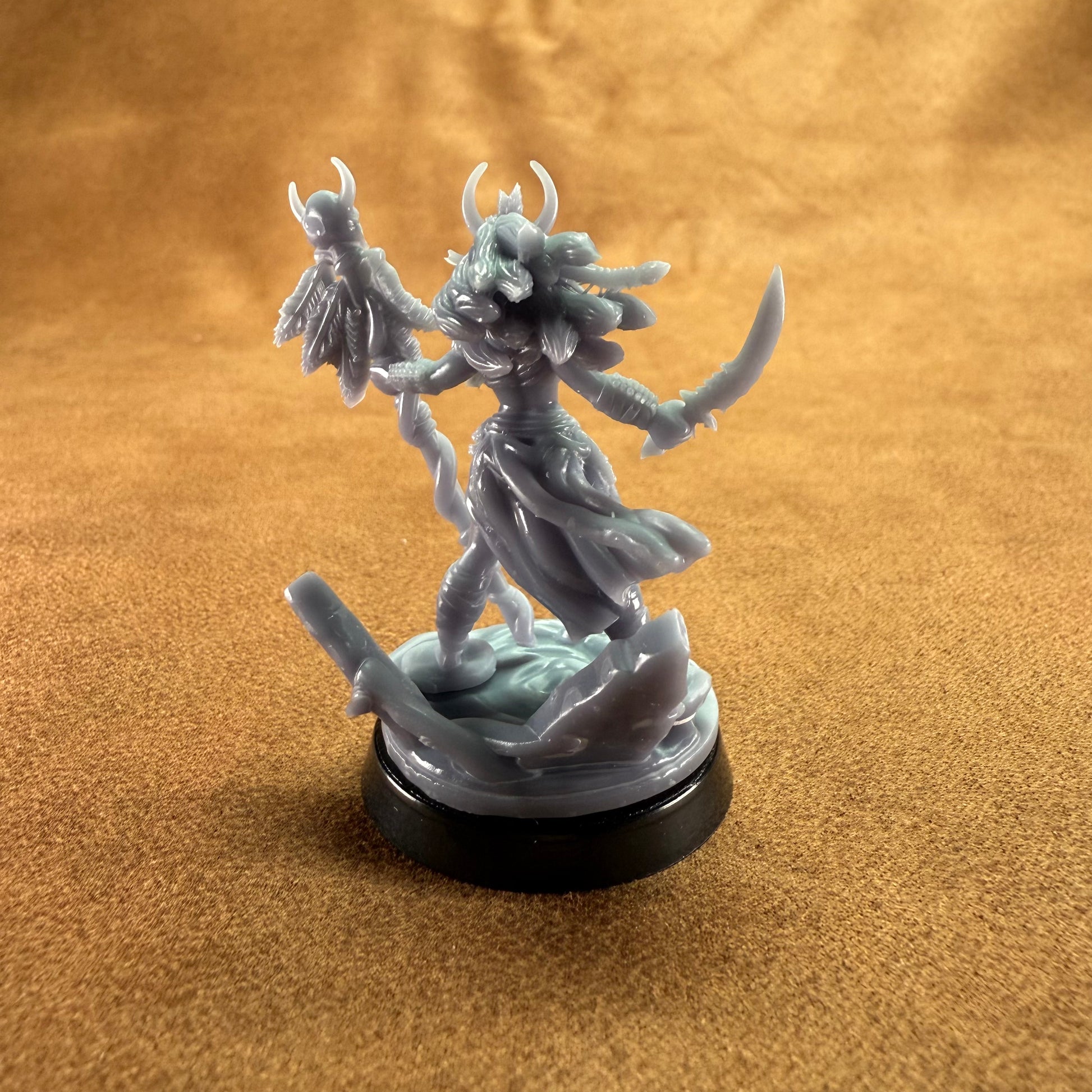 Fantasy figurine on a brown surface