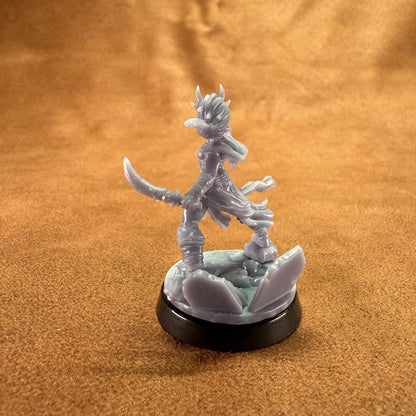 Fantasy figurine on a round base against a brown background