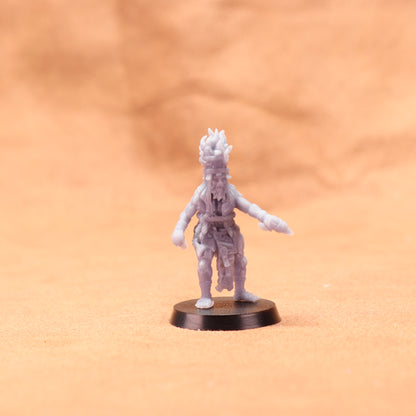 Miniature figurine on a brown surface