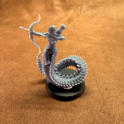 serpent lady warrior model on a brown background