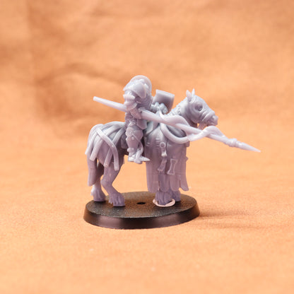 Gray miniature figure on a round base against an orange background