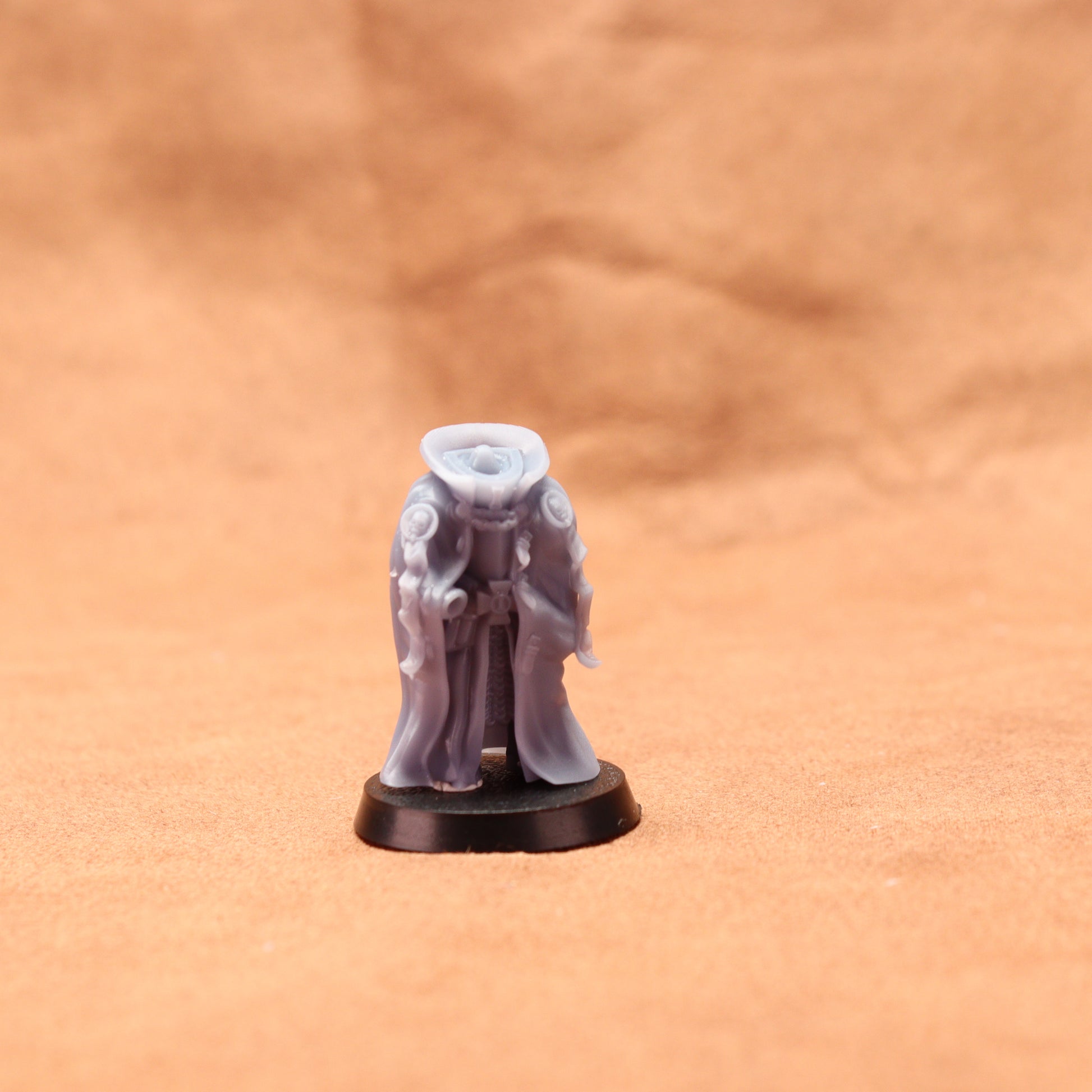 Small figurine on a brown surface