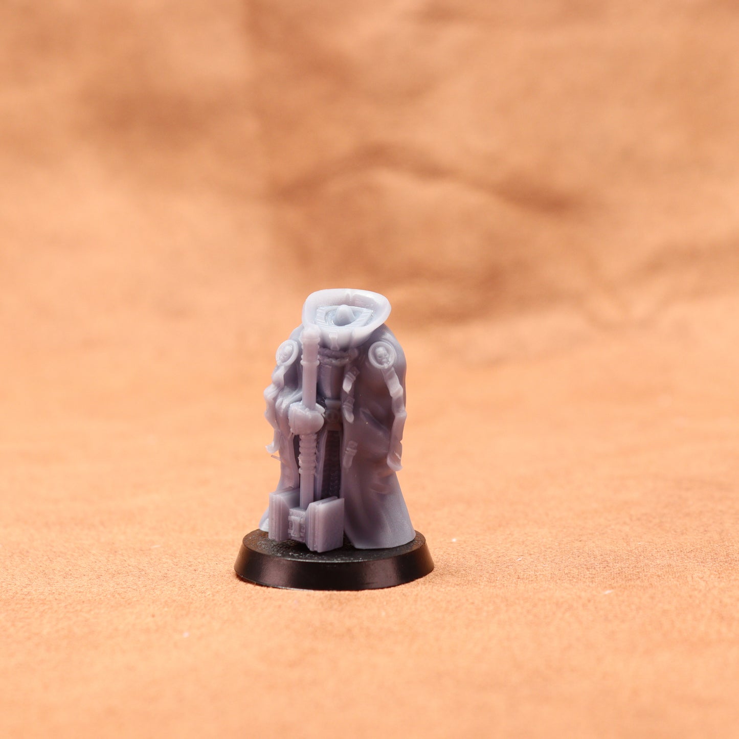 Small figurine on a brown surface