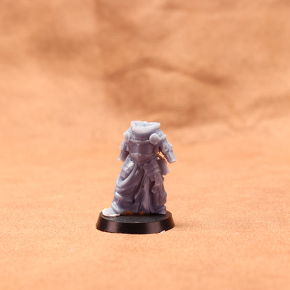 Miniature figurine on a brown surface