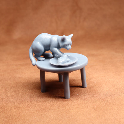 Gray cat figurine on a small table with a ball of yarn on a brown background